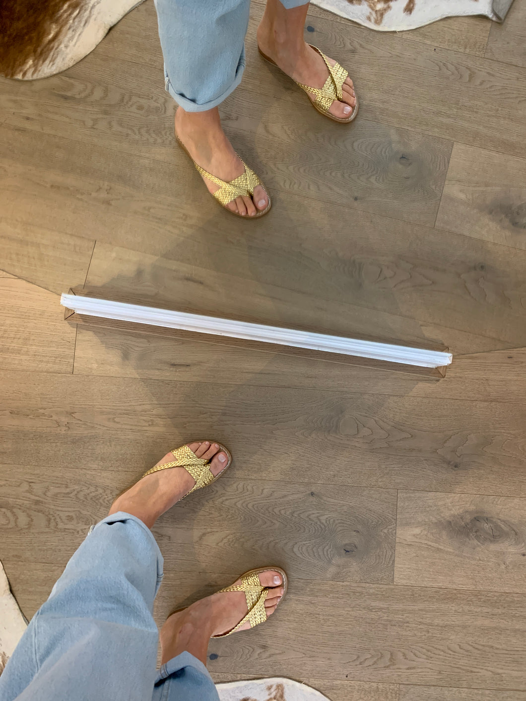 FLO slipper goud vlechtjes